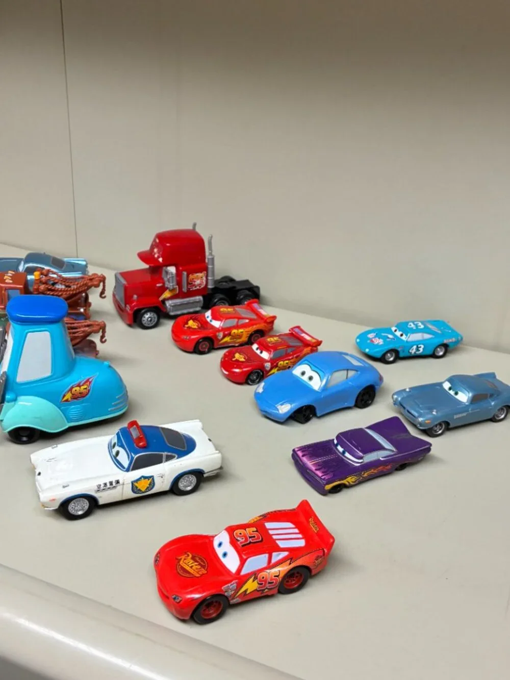 Disney Pixar Cars PLASTIC Lot Lightning McQueen Mack Truck Mater